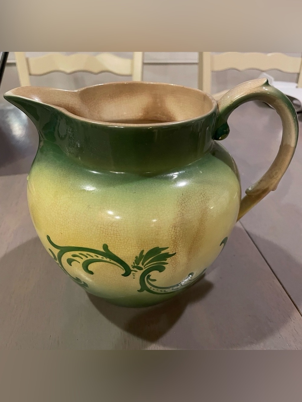Elegant Green and Cream Ceramic Pitcher